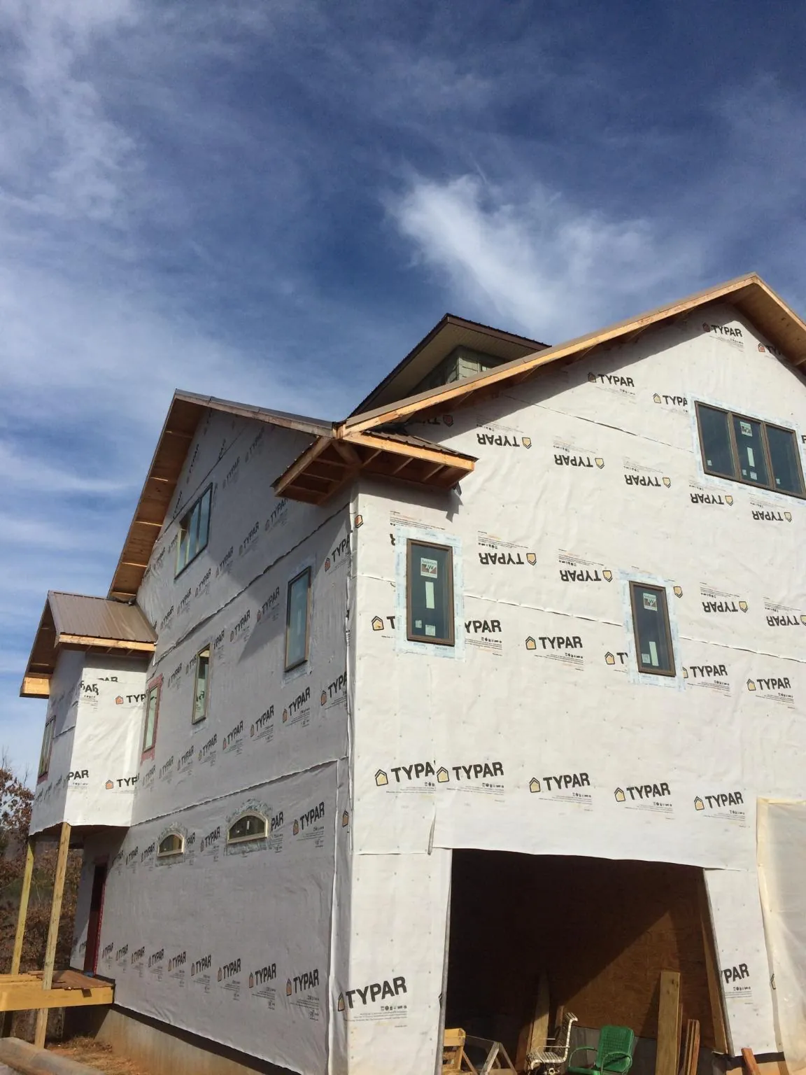 Stick built house wrapped in Typar with new roof framing and dormers in Lagrange